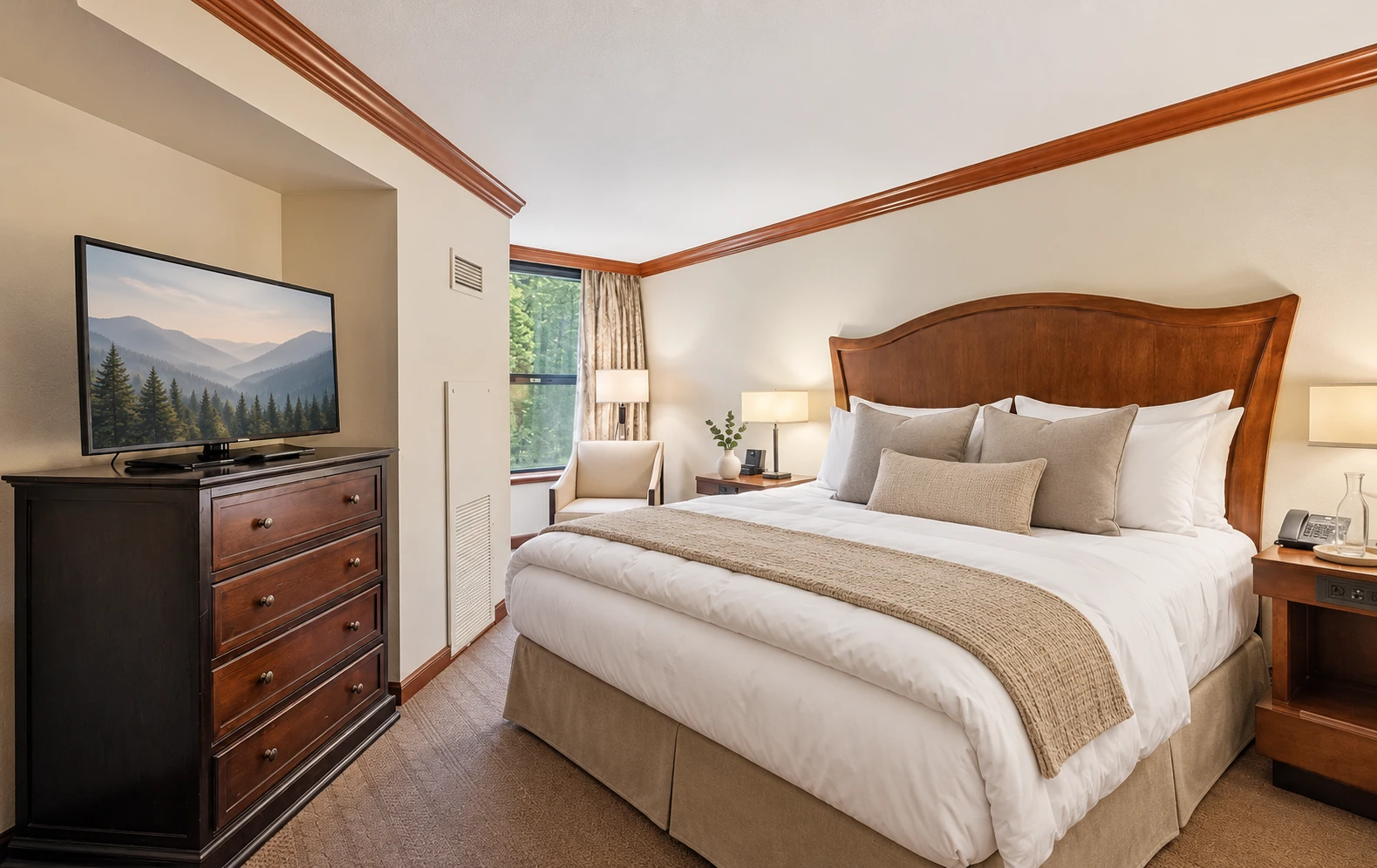 Two-bedroom corner suite — First private king bedroom with an en suite bathroom; digitally styled linens and accessories