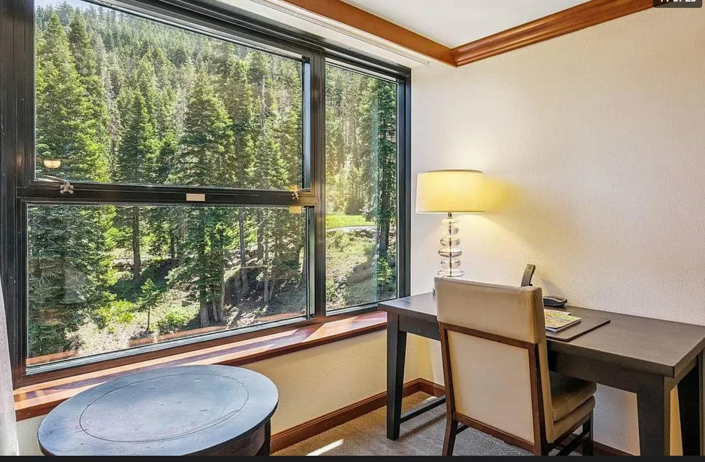 King room — Desk & forest outlook; digitally styled linens and accessories